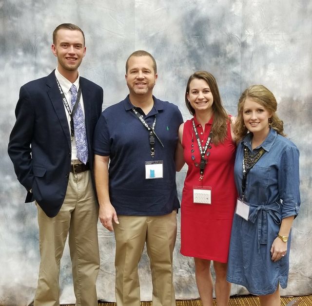 First year teachers Brandon Poole and Addie Tucker are pictures with two of their former agriculture teachers Cale Watkins and Anna Watkins